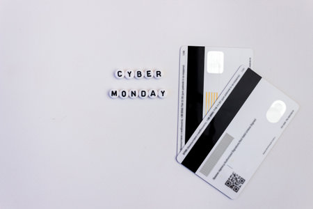 Cyber Monday inscription with a payment card on a white background. Online shopping concept. copyspace.の写真素材