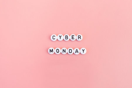 Cyber monday lettering on pink background. Online shopping concept on the internet.の写真素材