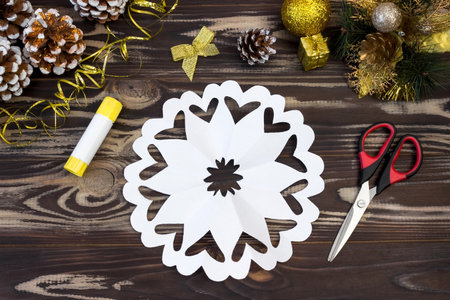Snowflake ballerina paper. Step by step photo instruction. DIY concept. Children's Christmas and New Year's crafts. Step 10の写真素材