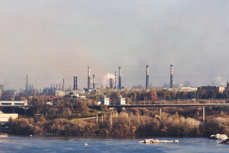 Industrial smoke emission from factory chimneys. Zaporozhye, Ukraine. The concept of the problem of protecting the environment. air pollution.の写真素材