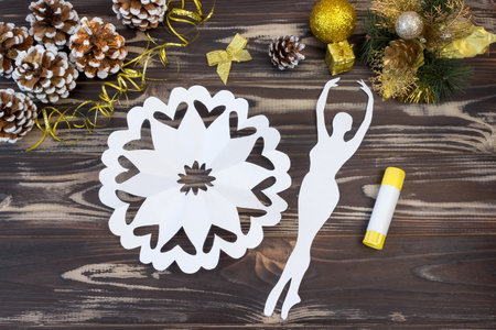 Snowflake ballerina paper. Step by step photo instruction. DIY concept. Children's Christmas and New Year's crafts. Step 11の写真素材