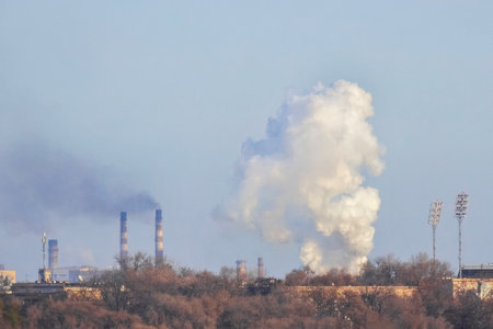 Industrial smoke emission from factory chimneys. Zaporozhye, Ukraine. The concept of the problem of protecting the environment. air pollution.の写真素材