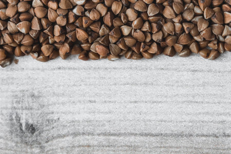 Buckwheat grains on a white background. Space for text.の写真素材