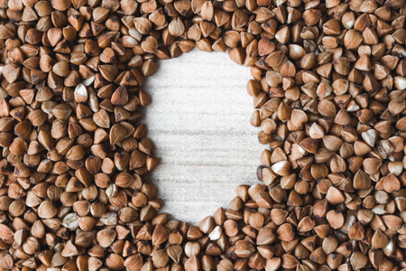 Buckwheat grains on a white background. Space for text.の写真素材