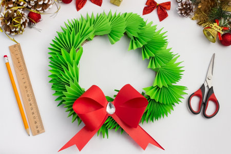 Christmas wreath made of colored paper. DIY concept. Handmade at home. step by step instructions. Step 24の写真素材