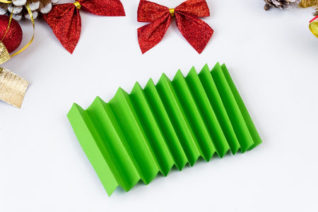 Christmas wreath made of colored paper. DIY concept. Handmade at home. step by step instructions. Step 15の写真素材