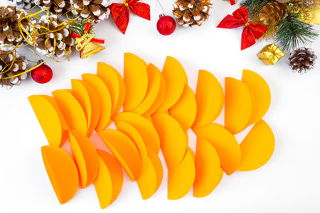 DIY colored paper tiger. Christmas and New Year's toy on the tree. Symbol of 2022. Children's crafts. step by step instructions. Step 3の写真素材