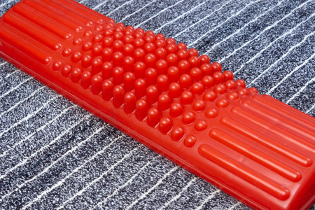 Acupuncture massager for acupressure of the feet. alternative medicine concept.の写真素材