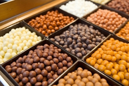 Chocolate dragee on the counter of a confectionery store.の素材