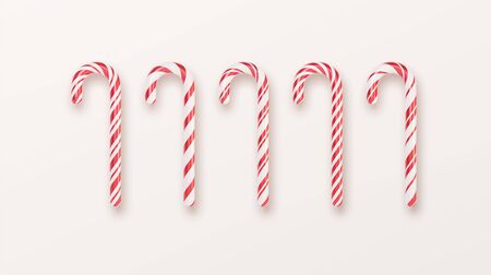 Realistic Xmas candy cane set isolated on white backdrop. Vector illustrationのイラスト素材