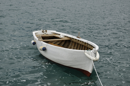 little white boat on the water in the Bay of Kotorの写真素材