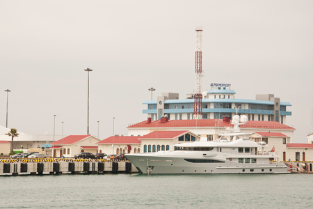 Sochi, Russia - May 4, 2017: Big yacht on the background of the building of Rosmorport Sochiのeditorial素材