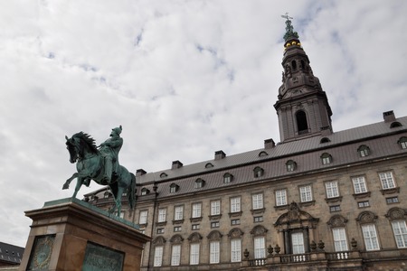 Denmark, Copenhagen - July 16, 2013: Parliament building and the statue of King Frederick Seventhのeditorial素材
