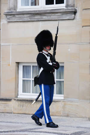 Copenhagen, Denmark-July 16, 2013: Changing of the guard in Amalienborg. Soldier of the Royal Danish life guards.のeditorial素材