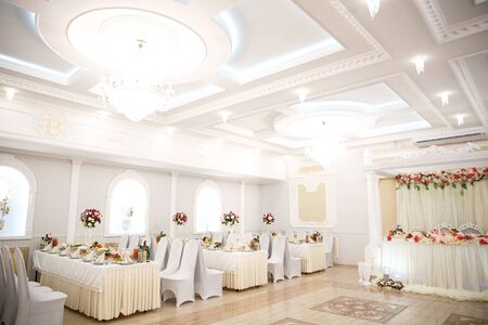 original wedding hall for a holiday decorated with flowersの写真素材