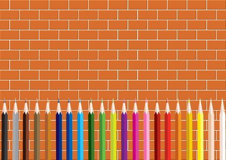 Colored pencils on a background of a brick wall.のイラスト素材