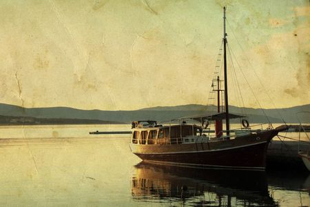 Retro wooden ship on vintage backgroundの写真素材
