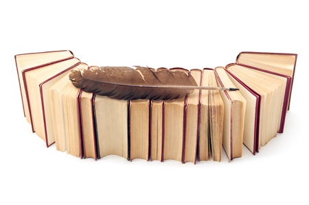 Old books with quill penの写真素材