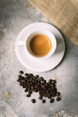 Fresh espresso on old metal surfaceの写真素材
