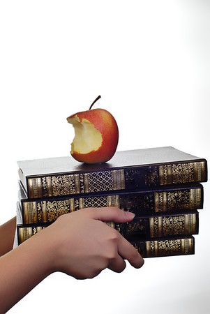books and apple on whiteの写真素材