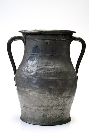 old cupreous pitcher on whiteの写真素材