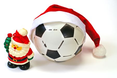  Santa Claus and the soccer ball on white isolatedの写真素材