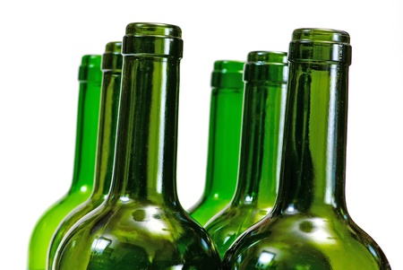   Wine bottles close-up isolated over white backgroundの写真素材