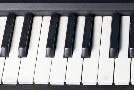 The black and white keyboard of the piano  despite the contrast, will work together to create sweet...