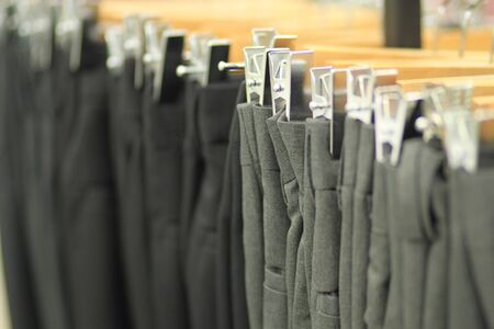 Close up a row of hangers to hang clothesの写真素材