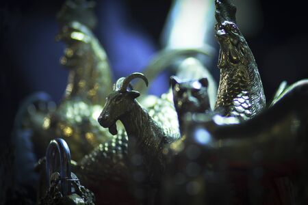 Selective focus. Film grain. Noise. Animal designs are made of copperの写真素材