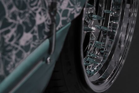 Gradient tone. Selective focus. Design of magnesium alloy rim with screw fastener and brake discの写真素材