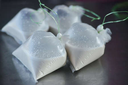 Coconut milk in plastic according to gramsの写真素材
