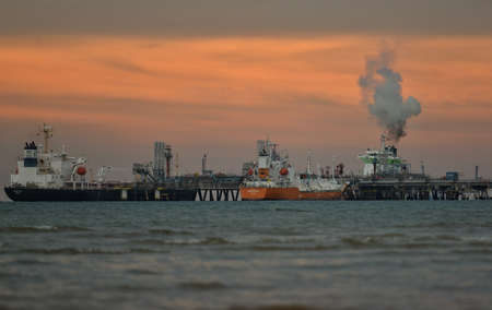 Cargo ship parking at the middle of the sea