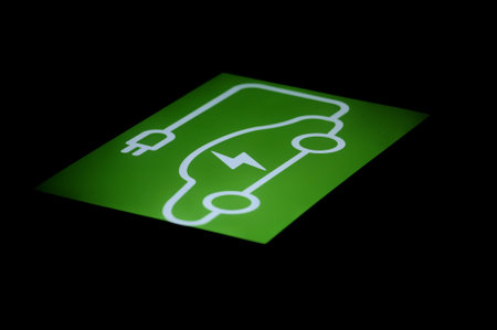 Electric car charger logo symbol