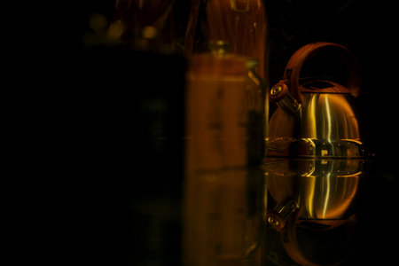 Stainless steel kettle on marble shelfの写真素材