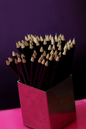 Stack the pencils in the containerの写真素材