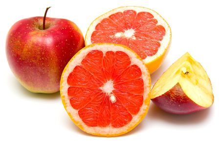 Juicy red grapefruit and ripe red apples. Isolated, shallow DOF.の写真素材