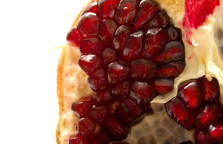 The pomegranate on white. Shallow DOF. Macro, isolationの写真素材