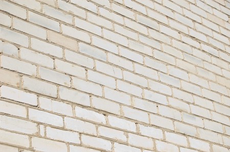 Texture of a wall of the house from a white brick. A background