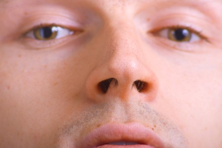 Portrait of the young men. Closeup. Shallow DOF, focus on noseの写真素材