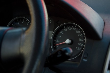 Speedmeter of the car on black background. Shallow DOFの写真素材