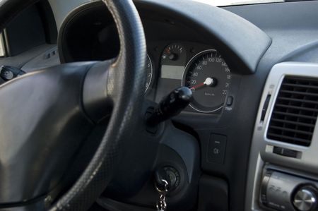 Speedometer of the car on black background. Shallow DOF