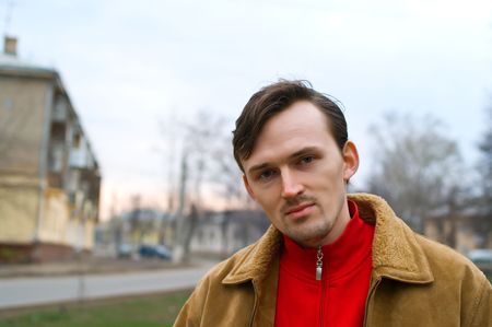 Portrait of the young men against urban landscapeの写真素材