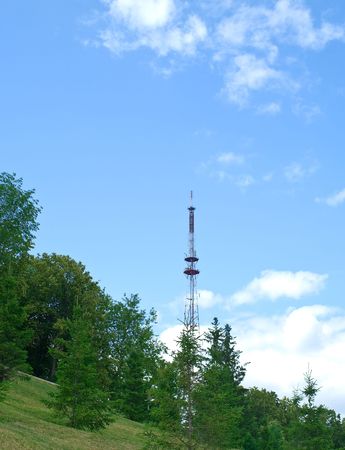 Telecommunication mast against summer landscape. Ufa city, Bashkortostan, Russiaの写真素材