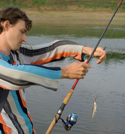 The young men has tricked fishの写真素材