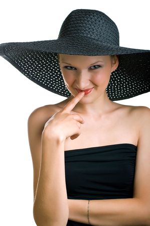 Portrait of artful young women in black hat on white background. Isolationの写真素材