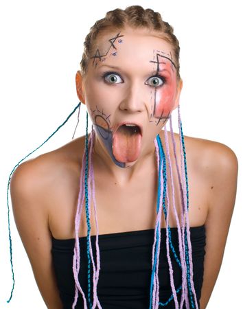 Portrait of beautiful young girl with with put out a tongu. Isolated on white backgroundの写真素材