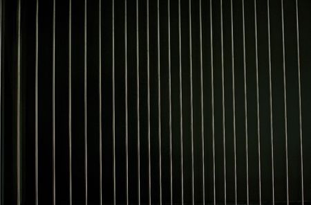 Metal lattice on a black. Abstract backgroundの写真素材