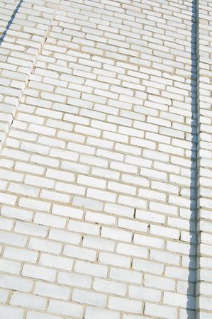Texture of a wall of the house from a white brick. A backgroundの写真素材