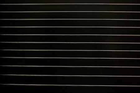 Metal lattice on a black. Abstract backgroundの写真素材